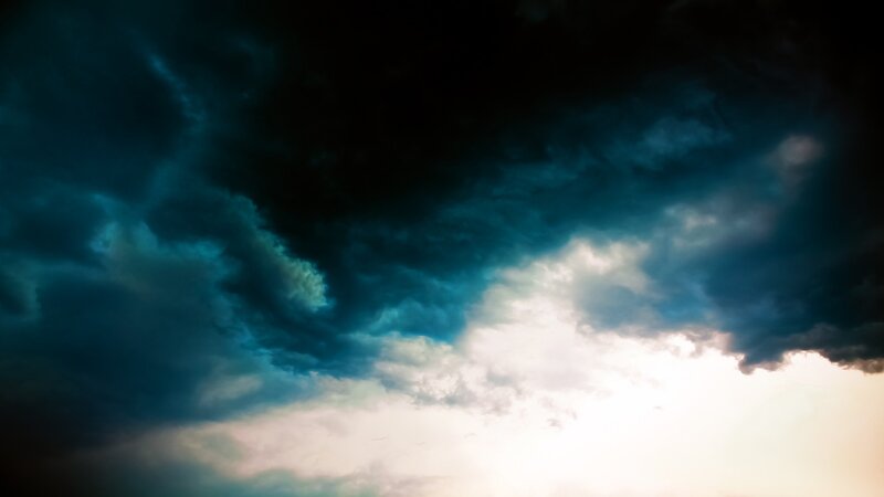 dark storm clouds at sunset