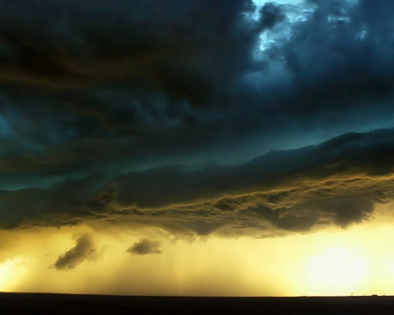 Dark storm clouds over a plain