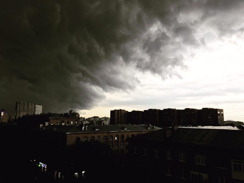 Dark Storm Clouds over City — Gray
