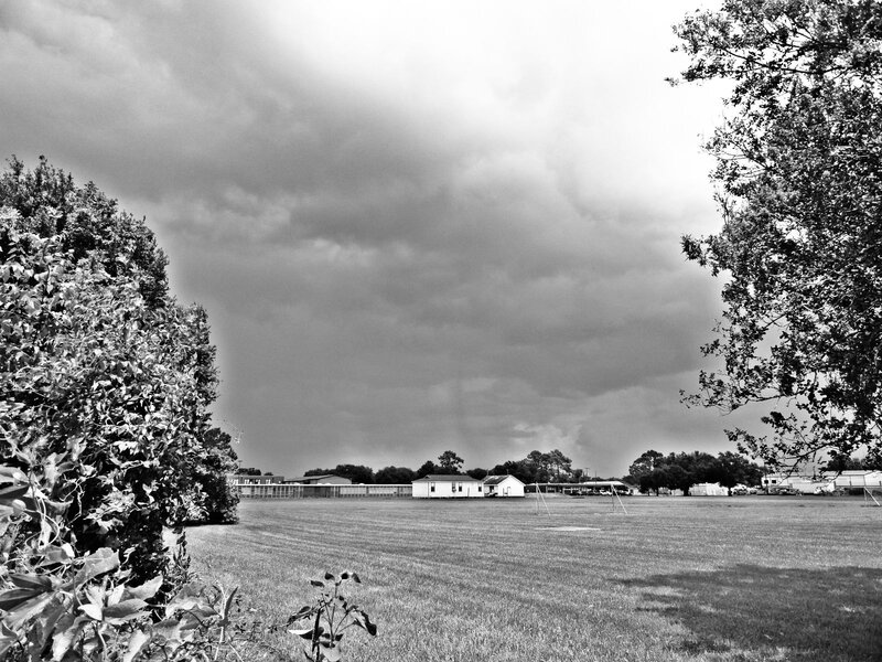 Dark Storm Clouds over Field — Black