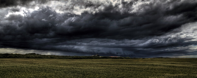 Dark Storm Clouds over Field — Gray, Dramatic, Photograph
