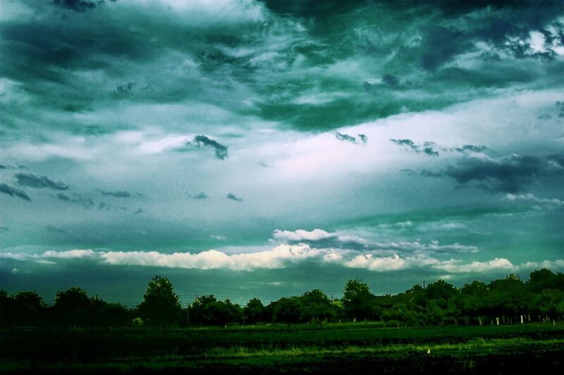Dark Storm Clouds over Field — Green, Dramatic