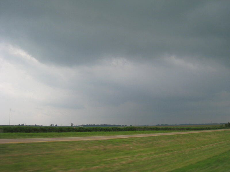 Dark Storm Clouds over Field — Green