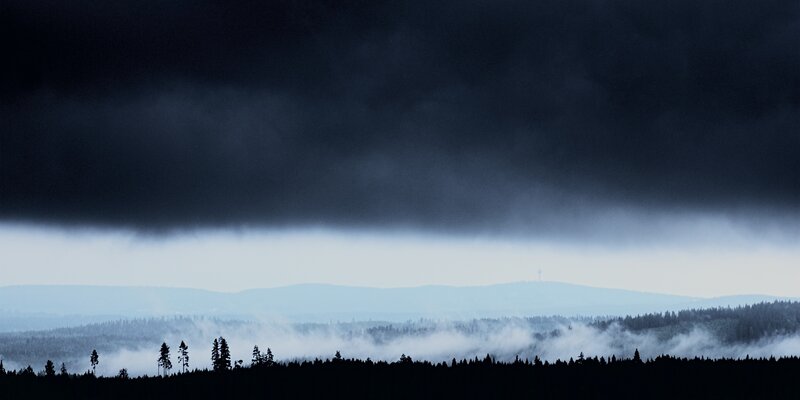 Dark Storm Clouds over Forest
