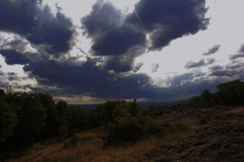 Dark Storm Clouds over Hills — Gray