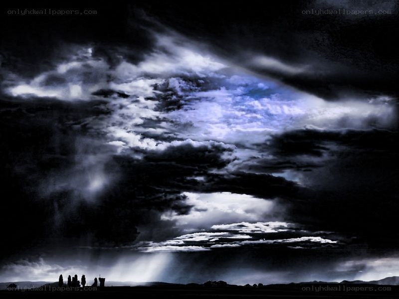 Dark storm clouds over landscape