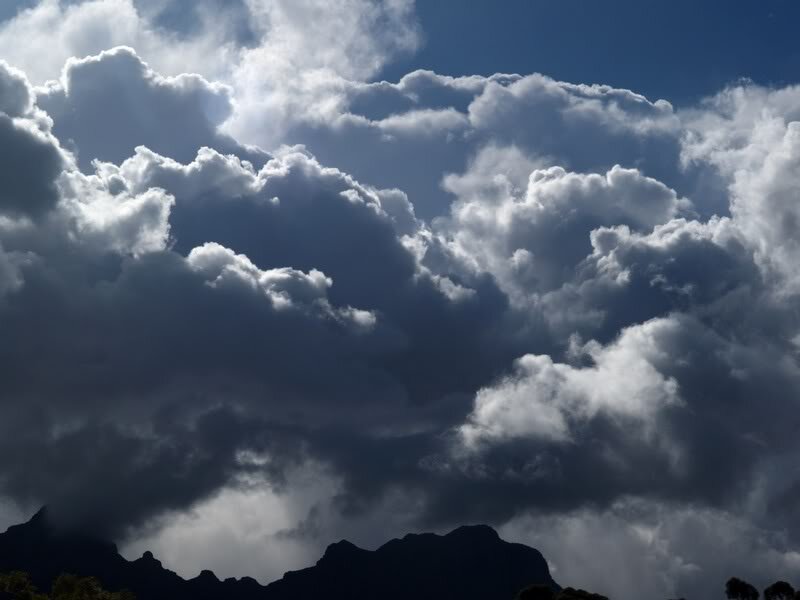 Dark Storm Clouds over Mountains — Gray