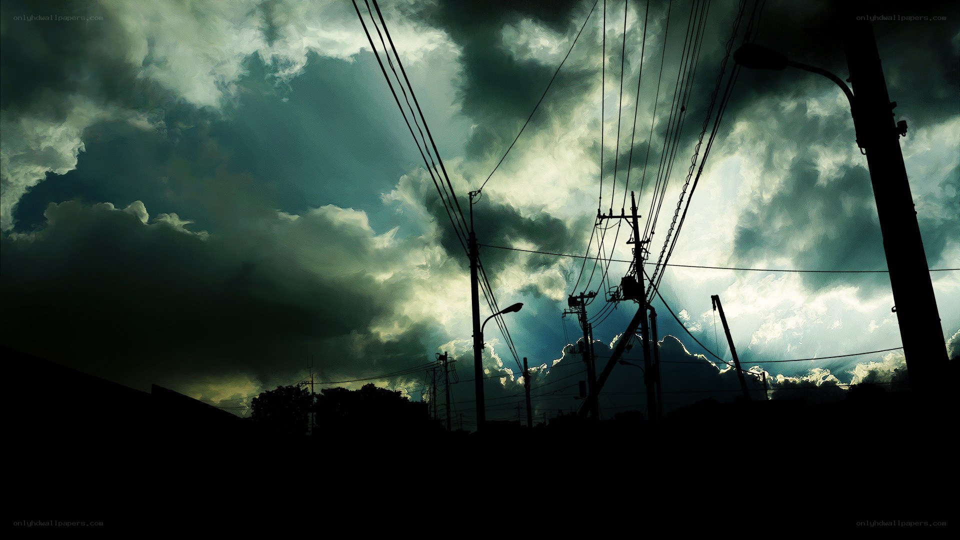 Dark storm clouds over power lines