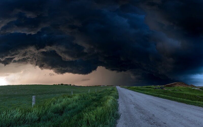 Dark Storm Clouds over Road