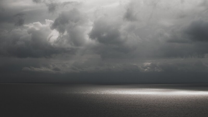dark storm clouds over sea