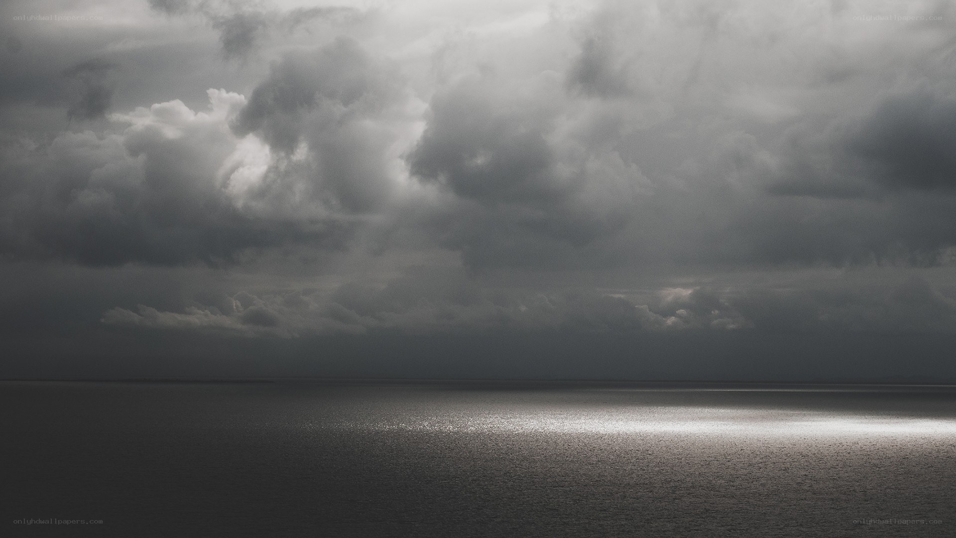 dark storm clouds over sea