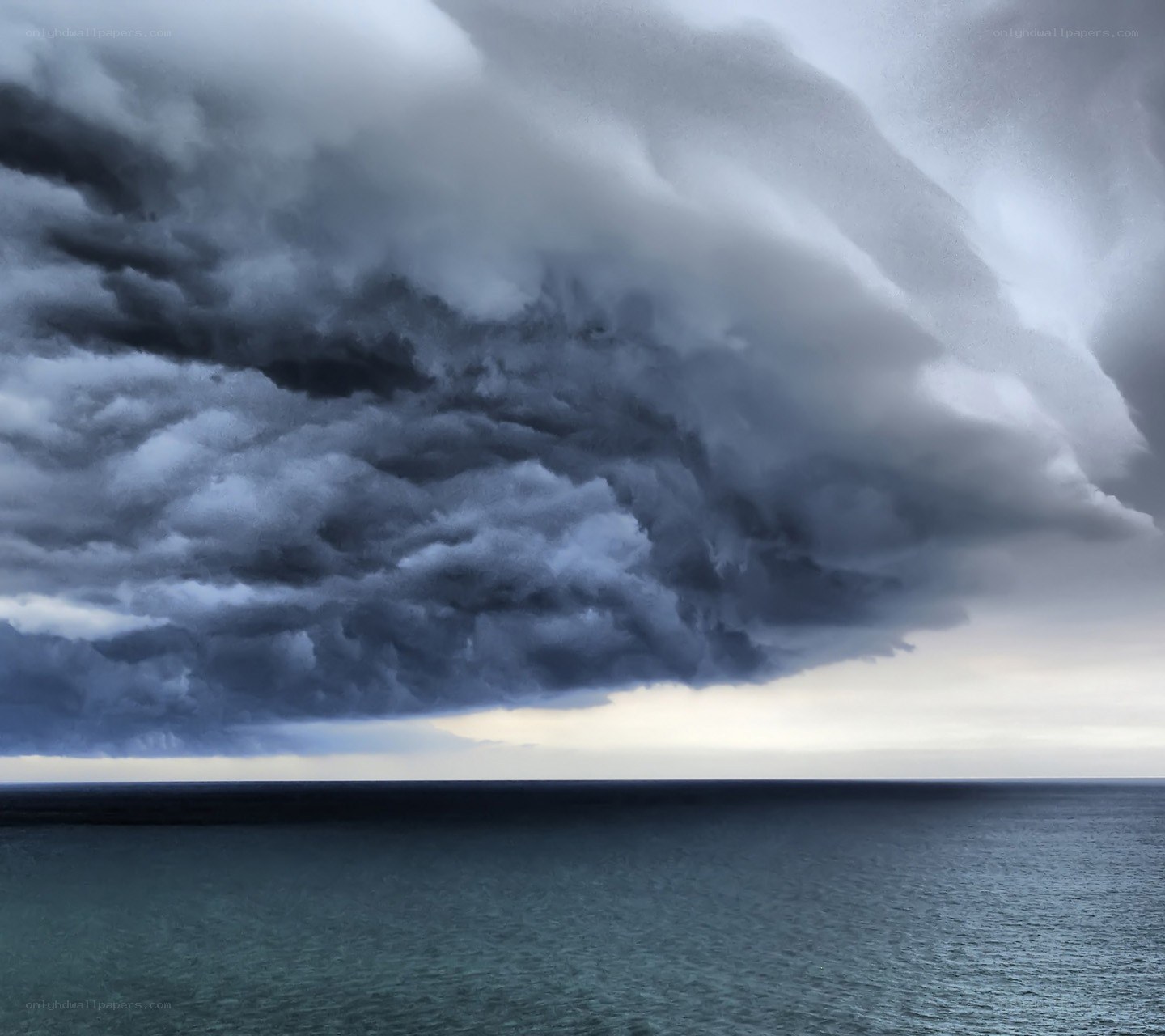 Dark storm clouds over the sea