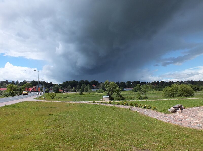 Dark Storm Clouds over Town — Green