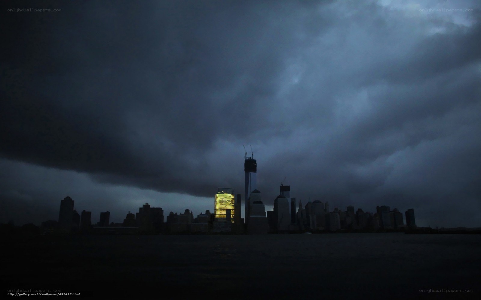 Dark storm over city skyline