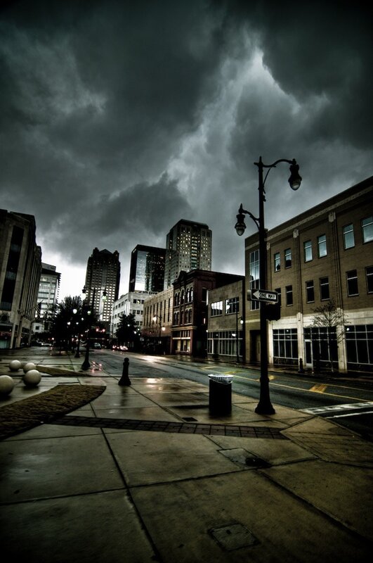 Dark storm over city street