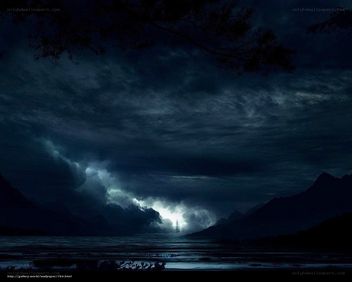 Dark storm over mountain lake