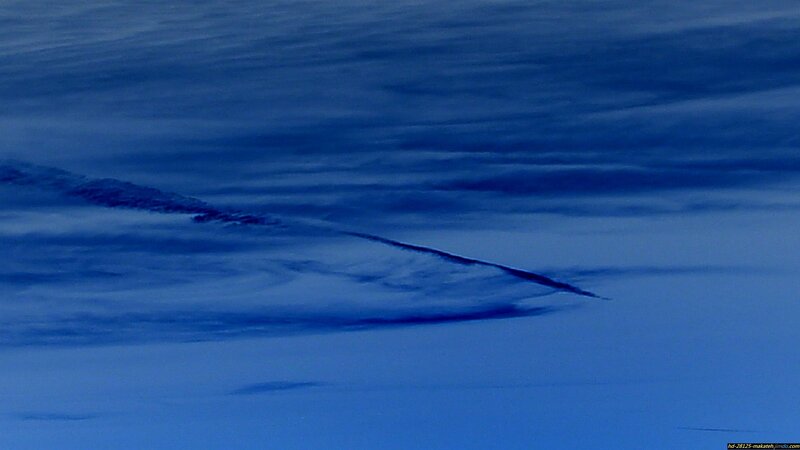 Dark Streak in Blue Sky