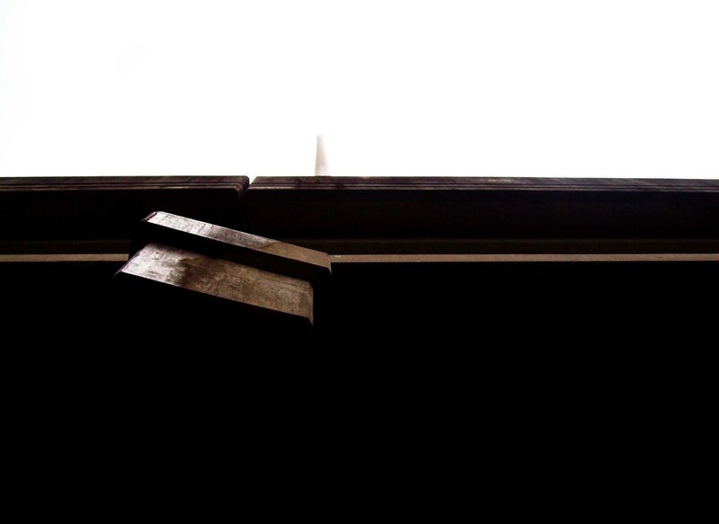 dark structure against bright sky