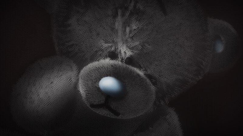 dark teddy bear close-up