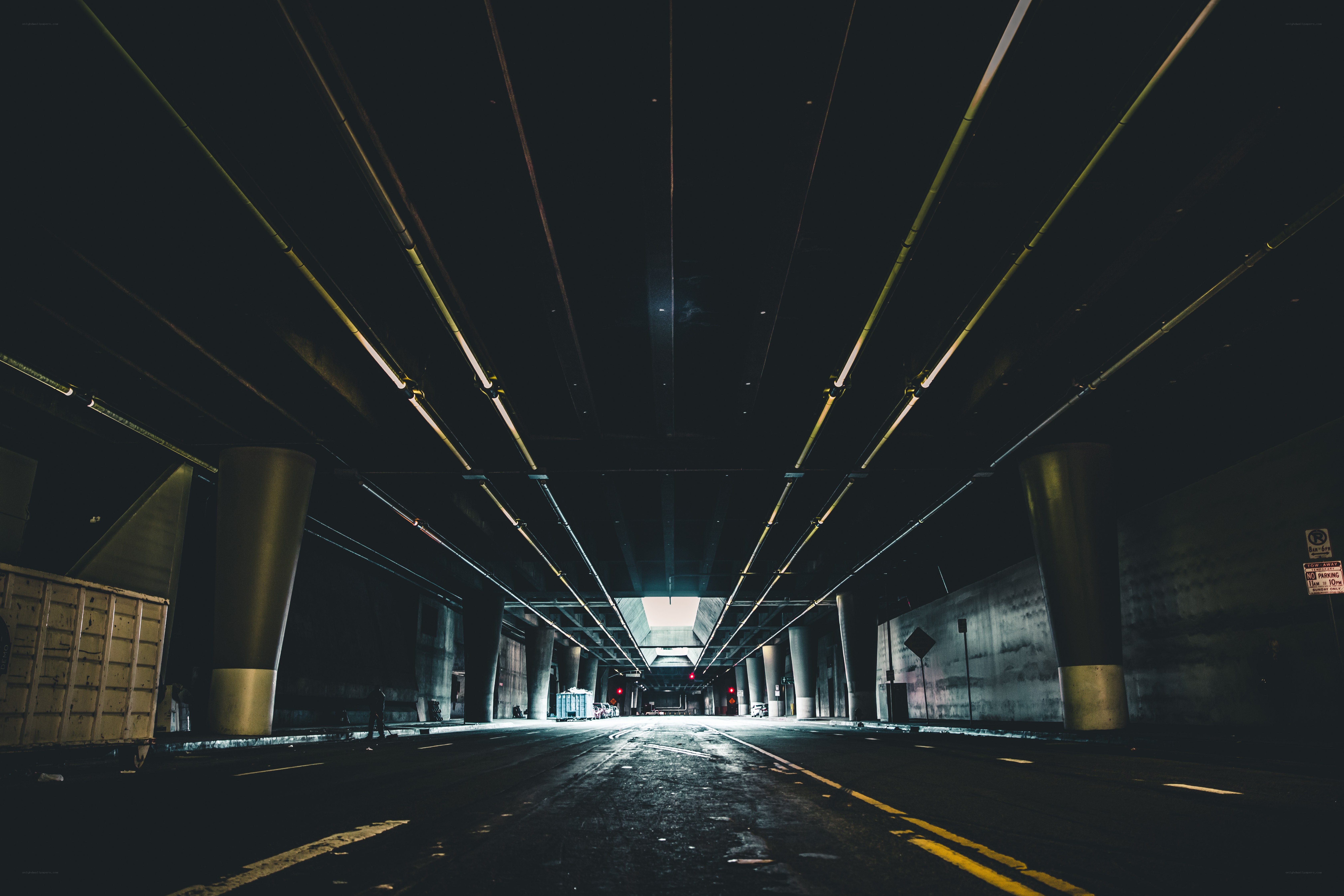dark tunnel under highway
