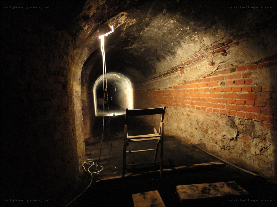 dark tunnel with chair