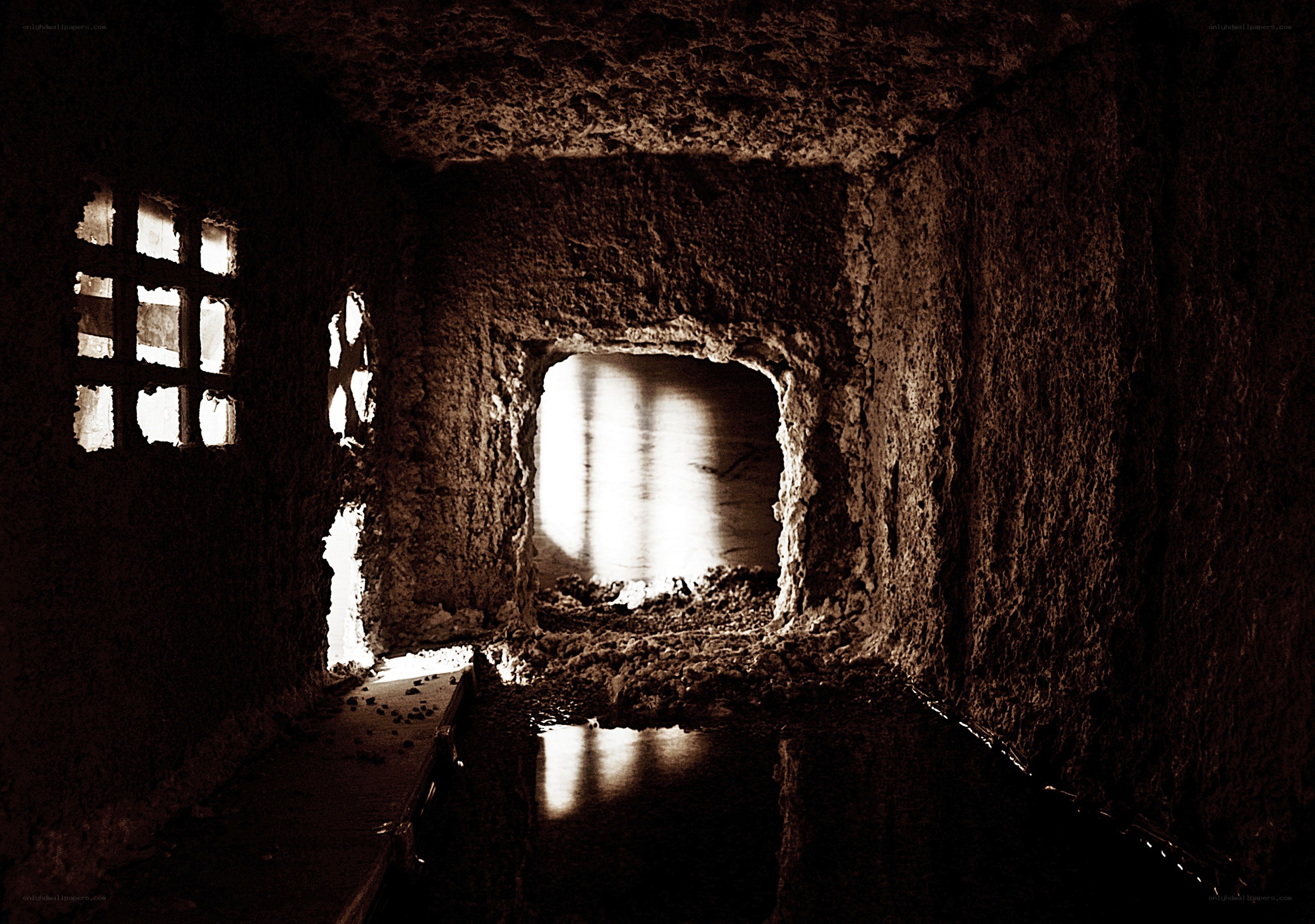 dark tunnel with light at end