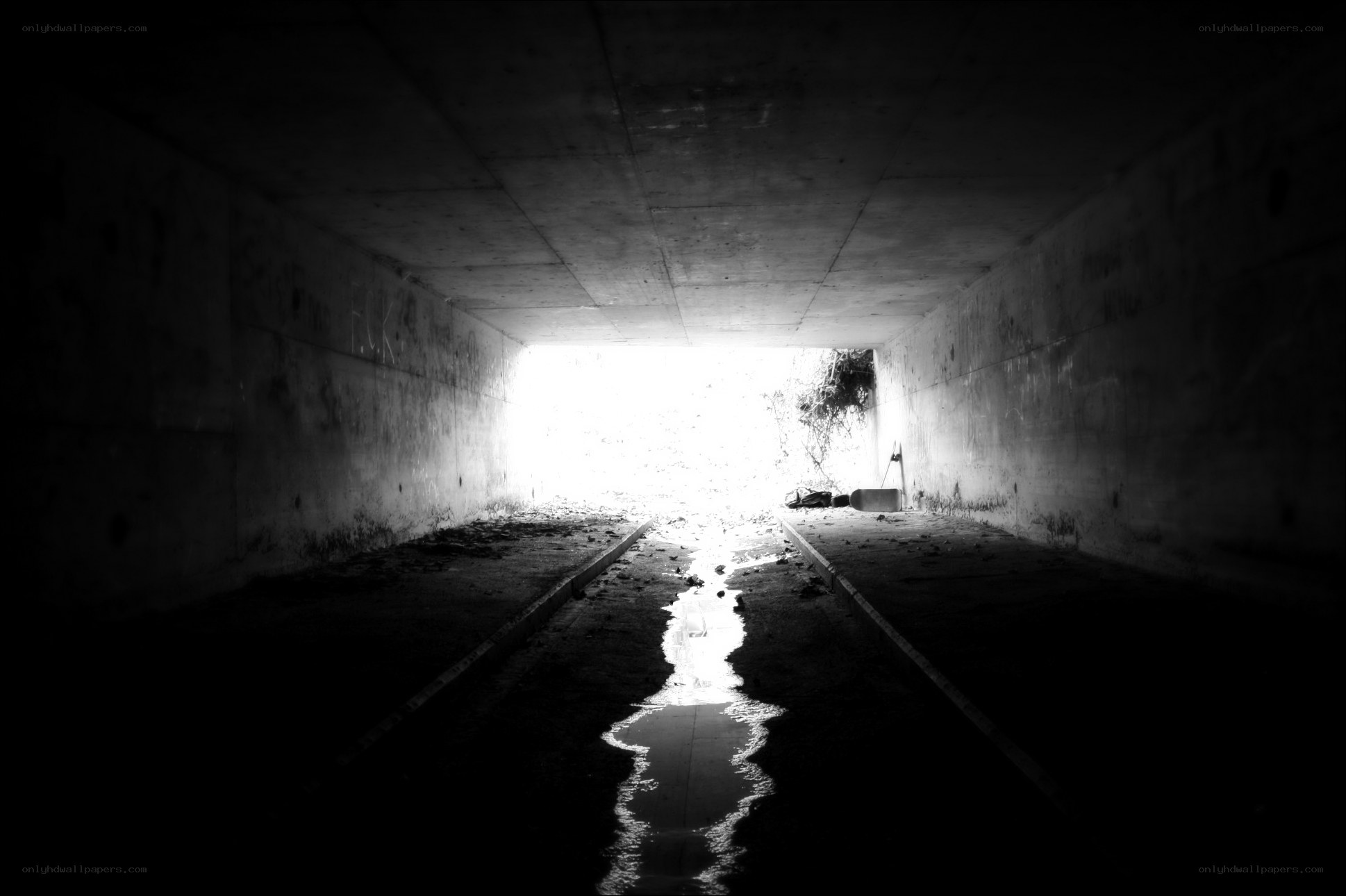 dark tunnel with light at end