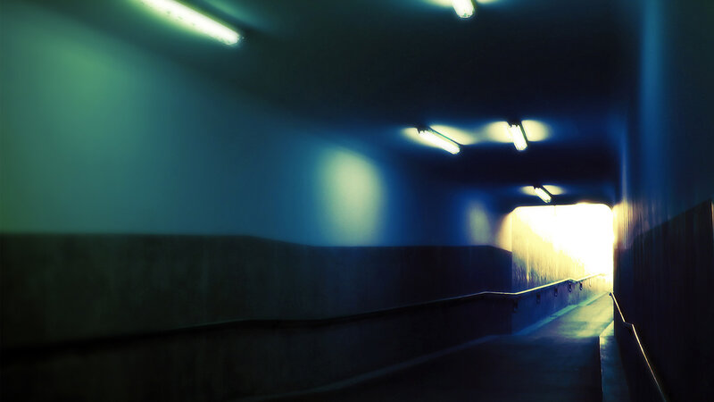 dark tunnel with light at end