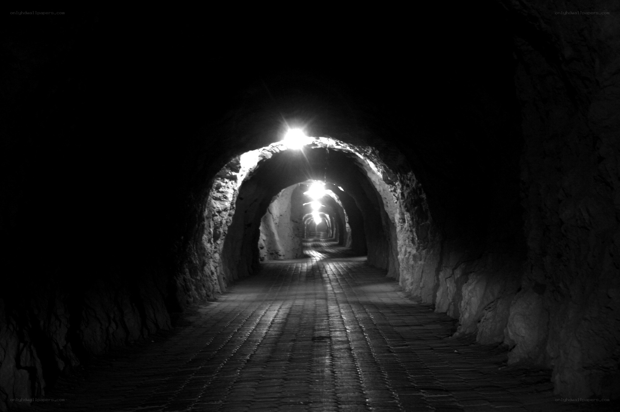 dark tunnel with lights
