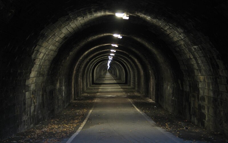 dark tunnel with lights