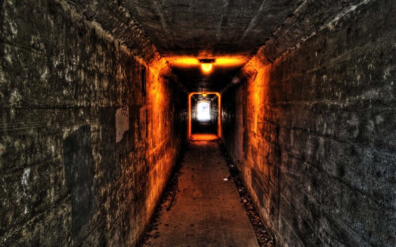 dark tunnel with orange light