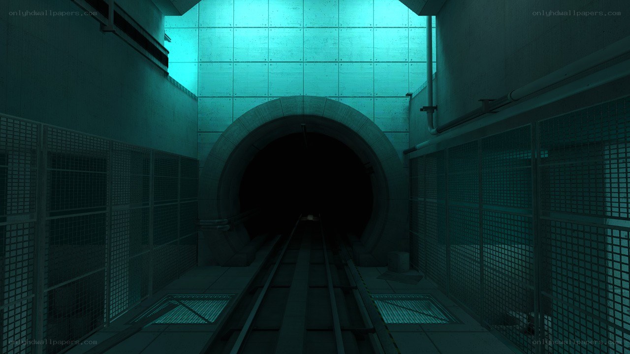 dark tunnel with tracks