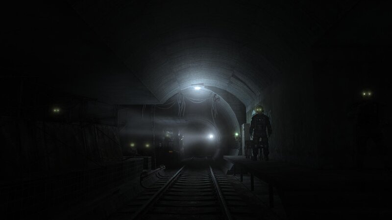 dark tunnel with train tracks