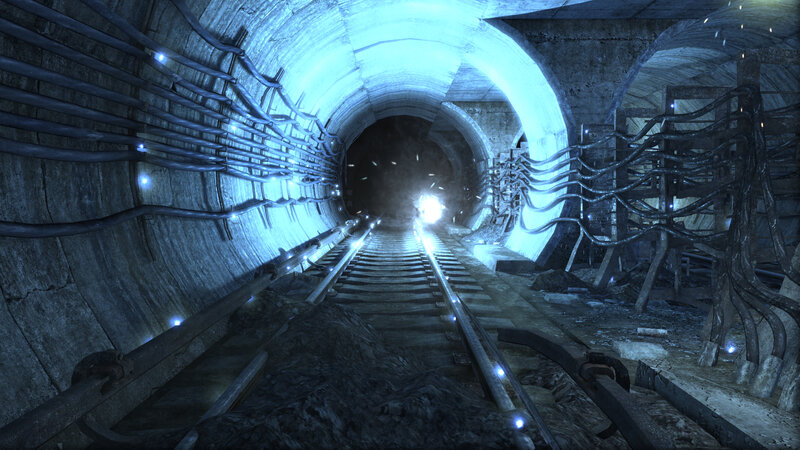 dark tunnel with train tracks