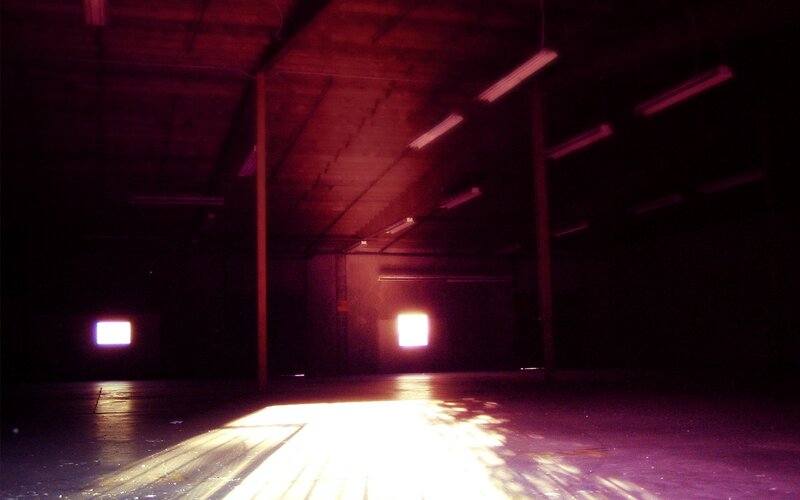 dark warehouse with glowing lights
