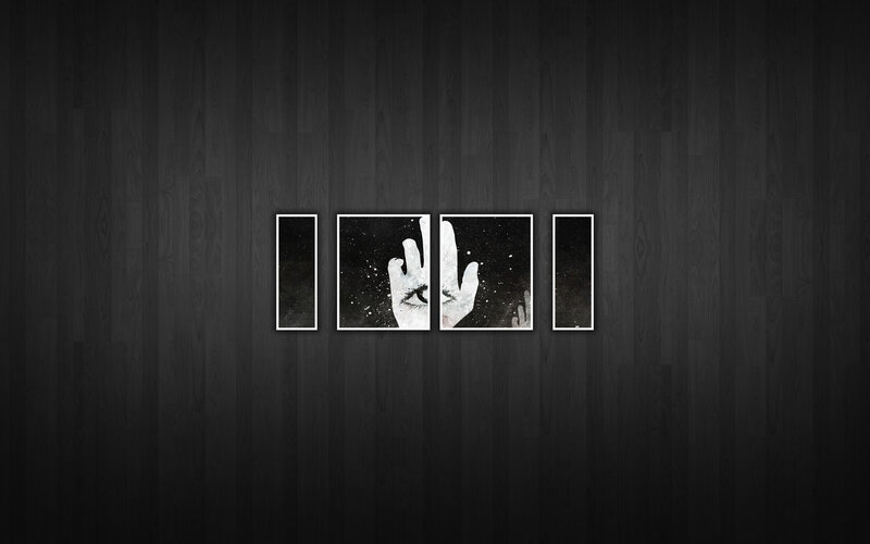 dark wooden wall with framed art