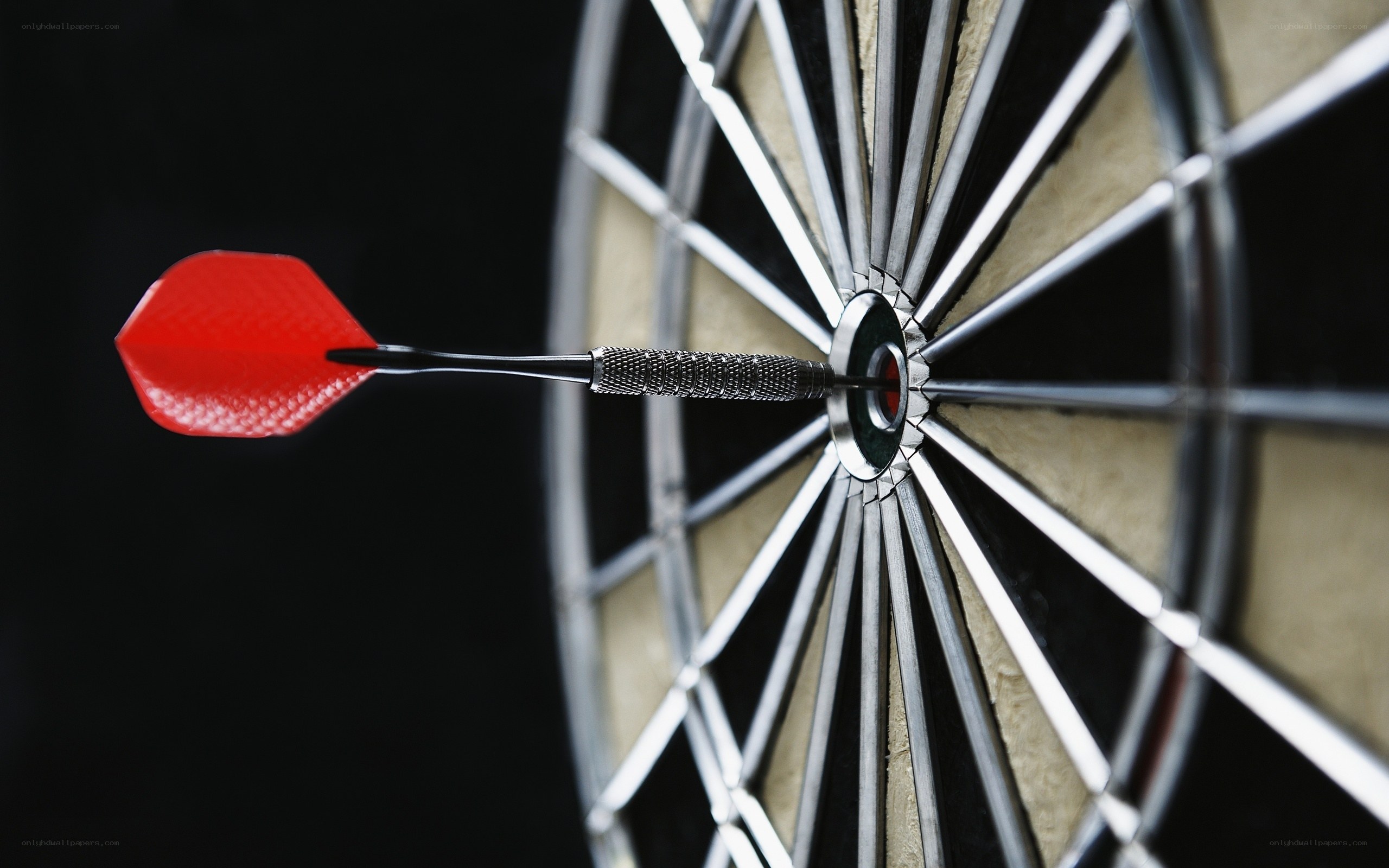 Dart hitting bullseye