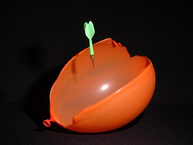dart in burst balloon