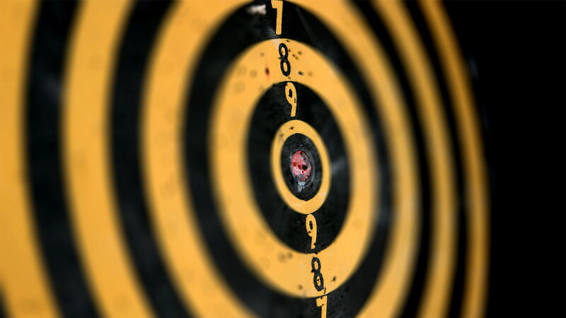 Dartboard with Dart — Yellow