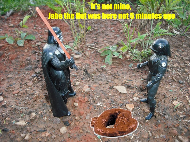 Darth Vader and a toy figure