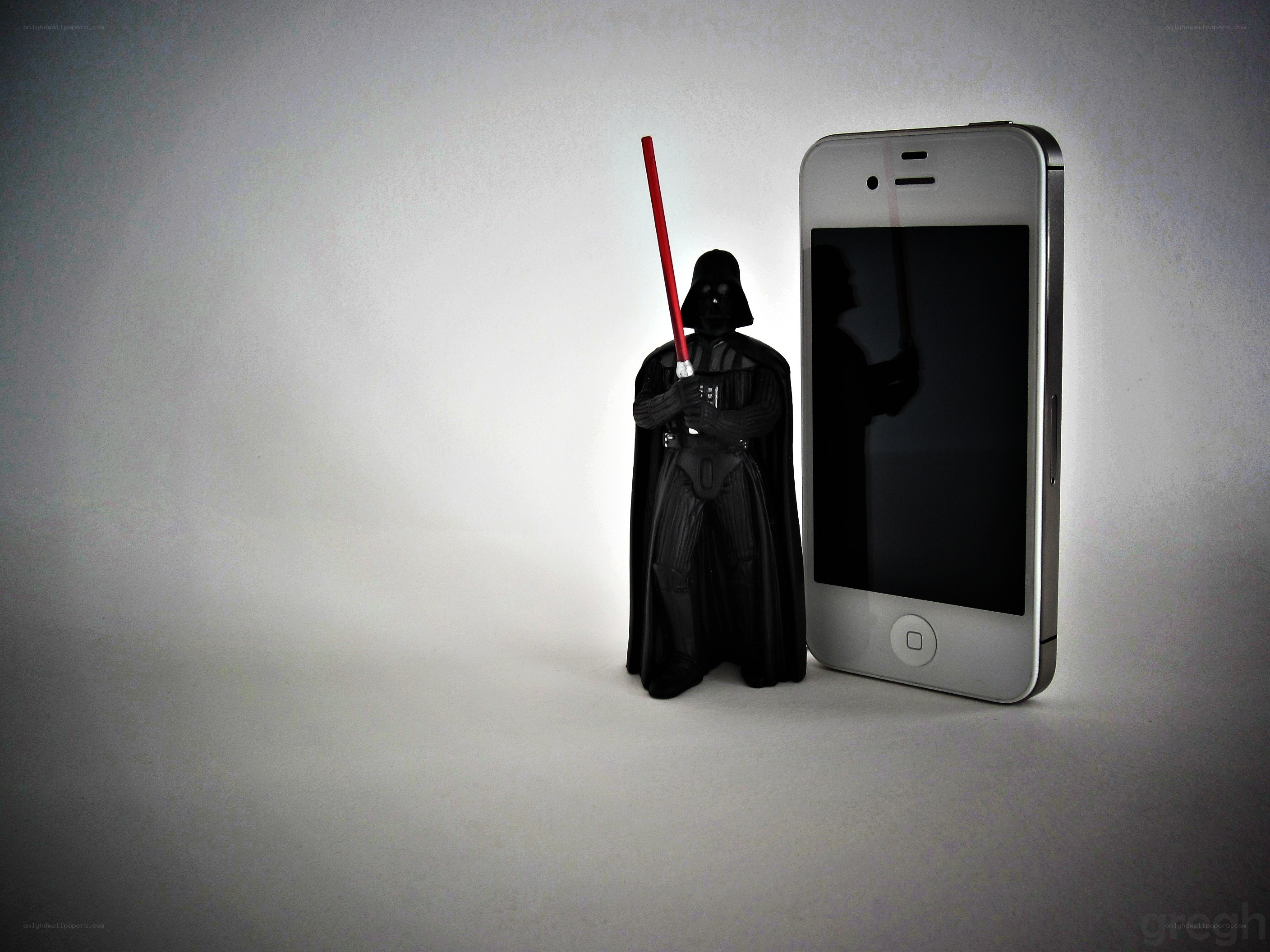 Darth Vader figure with iPhone