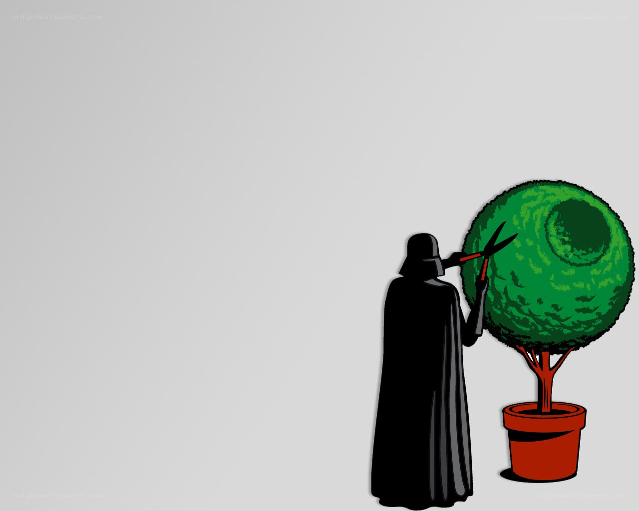 Darth Vader trimming a topiary