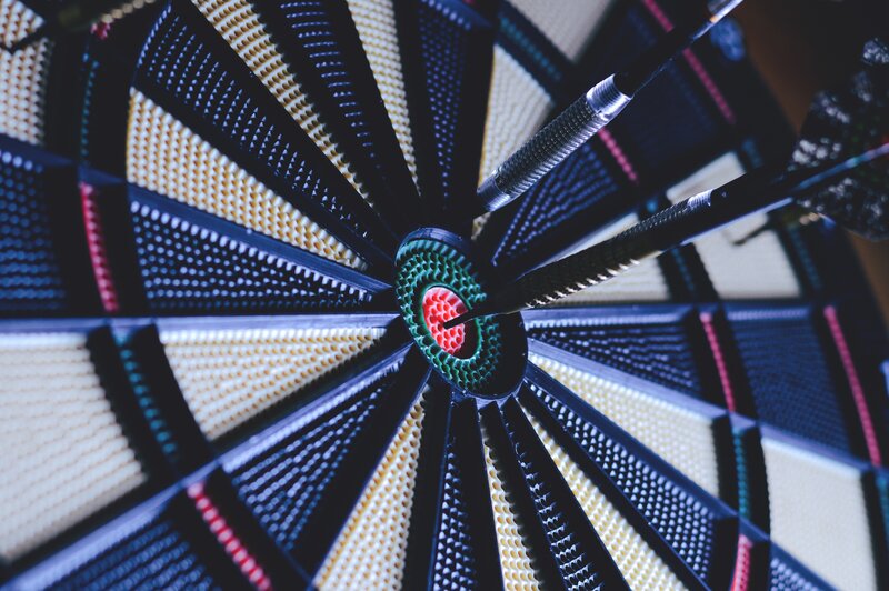 Darts on a Dartboard — Black