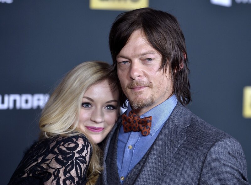 Daryl Dixon and a woman at an event
