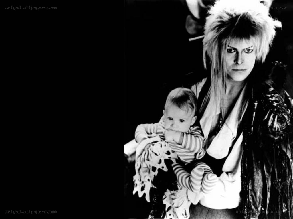 David Bowie holding a baby