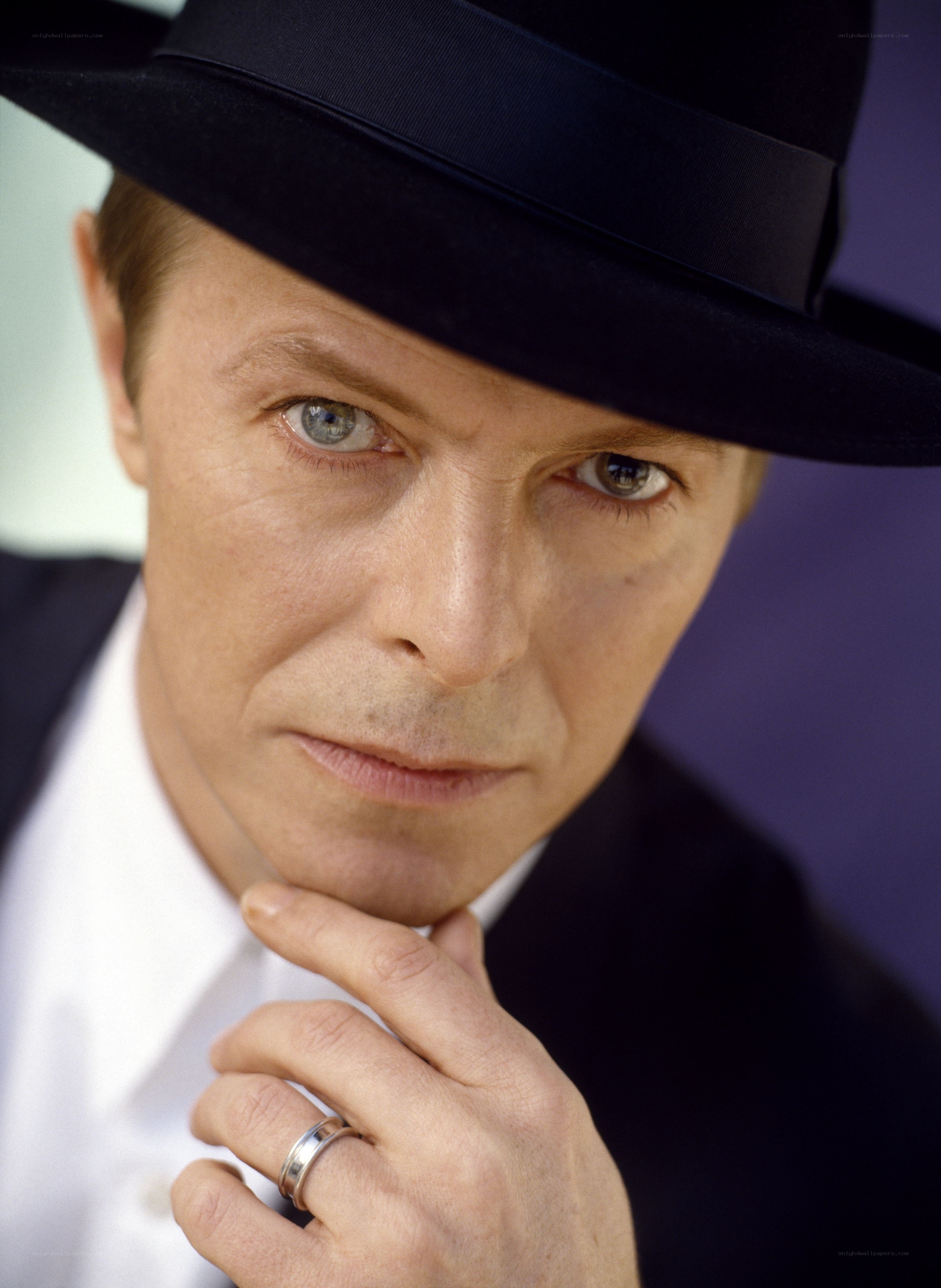 David Bowie in a black hat