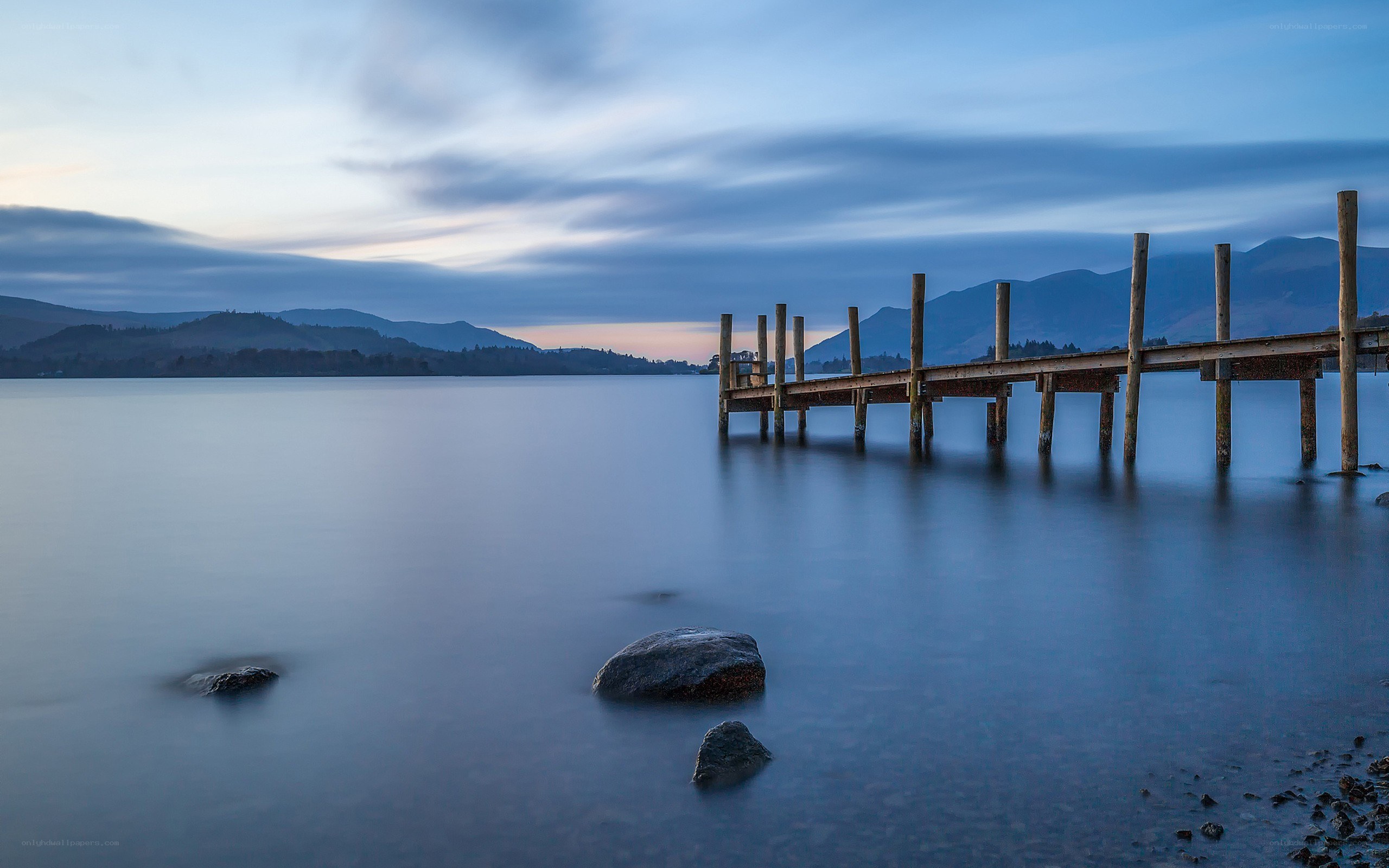 Dawn at a lakeside pier