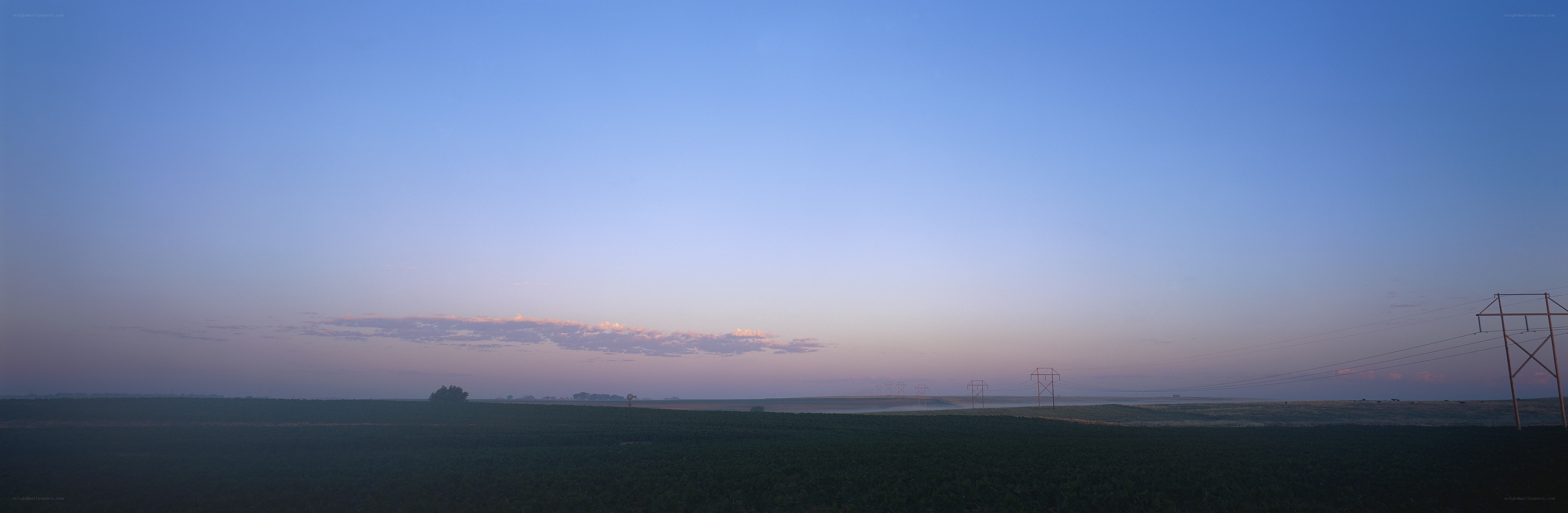 Dawn over a rural landscape