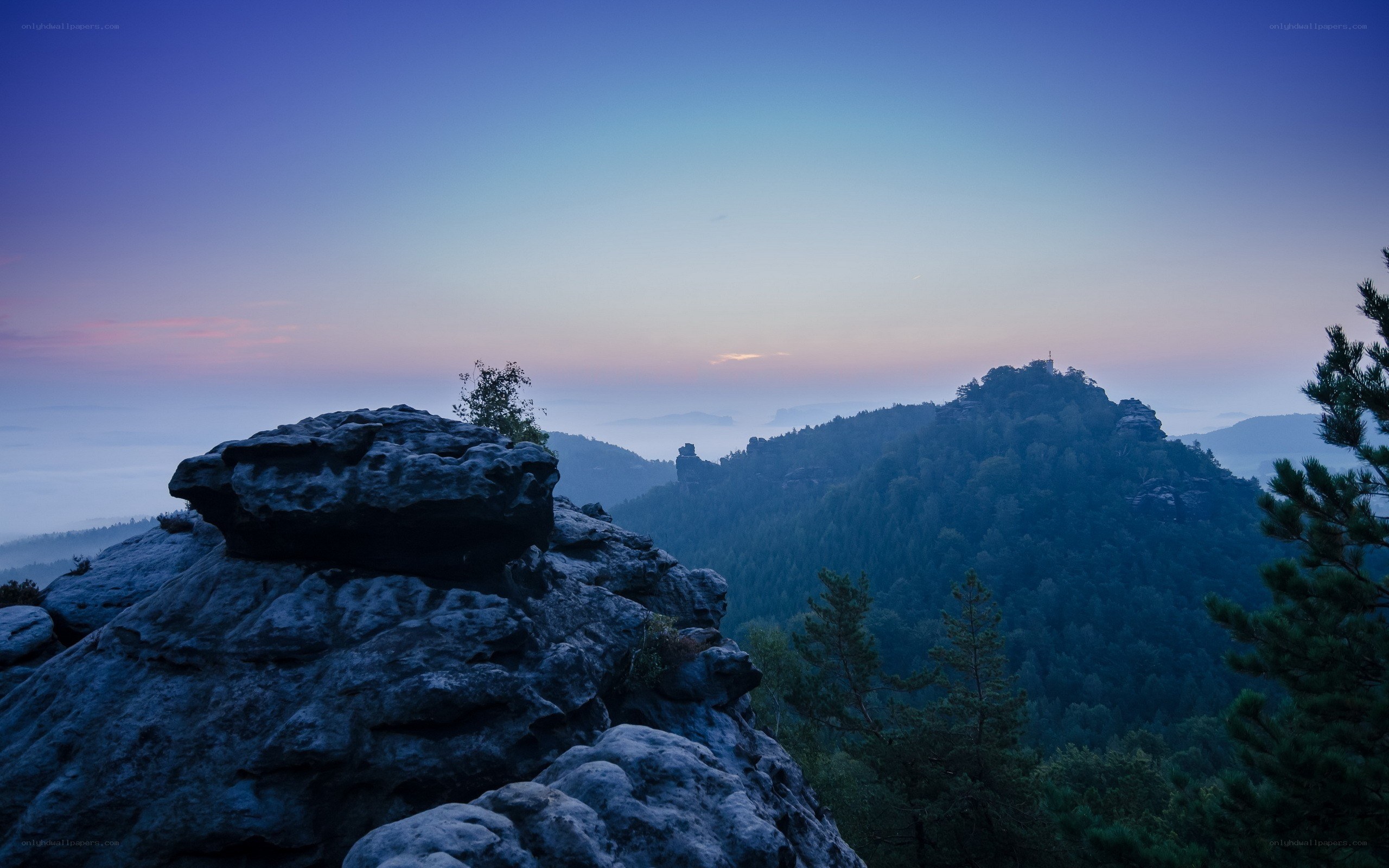 Dawn over rocky hills