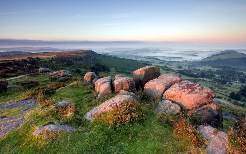 Dawn over rolling hills